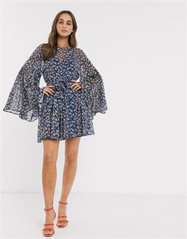 soft trapeze mini dress with fluted sleeve in navy floral animal print